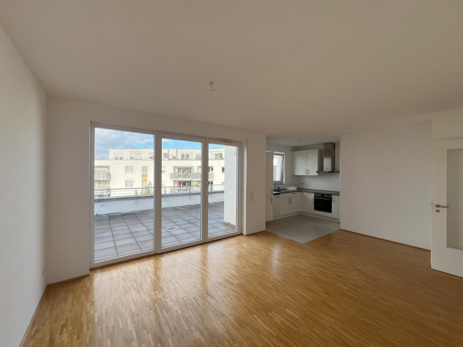 4 Zimmer Penthouse mit sonniger Dachterrasse! - Wohnzimmer mit offener Küche